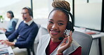 Telemarketing, woman and face with headset in call center for cold calling, upsell and about us. Coworking, sales agent and happy at workplace for product knowledge, lead generation and career pride