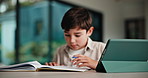 Homework, writing and child with tablet in home for online learning, research and thinking of answer. Student, house and boy with notebook, tech and studying for education, knowledge and assessment