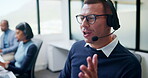 Call center, headset and man with customer support, advice or virtual communication in office. Tech agent, person or happy consultant with talking for help desk, problem solving or website service