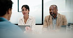 Interview, business and people in office with laptop, discussion or meeting for onboarding. Smile, candidate or hiring managers in agency with tech, evaluation or recruitment for career opportunity. 