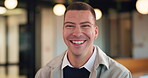 Smile, laughing and face of business man in office for about us, real estate agent and pride. Property development advisor, confidence and professional consultant with employee in agency for joke