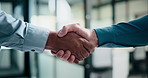 Handshake, welcome and business people in office with partnership, deal or finance agreement. Meeting, greeting and financial advisor shaking hands with investor for investment negotiation at agency