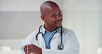 Smile, mask and face of doctor in hospital for virus protection, outbreak and virologist. Healthcare advisor, infectious disease expert and medical with black man in clinic for ppe and about us