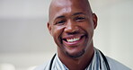 Laughing doctor and face with black man in hospital for healthcare advisor, about us and pride. Medical specialist, smile and wellness with male person in clinic for confidence, physician and joke