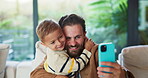 Father, child and hug with selfie at house for photography, social media and family blog. Happy, man and embrace kid for affection, profile picture update and capture moment with trust in living room