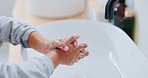Child, hands and soap with tap for hygiene, disinfection or cleanliness in bathroom sink or home. Kid, washing and rinse with skincare or scrub in basin for dirt, bacteria or germ removal in house
