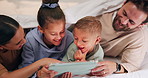 Happy, tablet and parents with kids on bed for watching movies, online videos and bonding. Family, home and children with mom, dad and tech for connection, internet and relax together on weekend