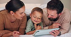 Night, tablet and parents with child on bed for watching movies, online games and streaming. Family, home and happy mom, dad and boy on tech for bonding, connection and relax in bedroom on website