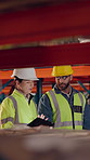 Tablet, discussion and supply chain employees in warehouse with inventory, stock or delivery approval. Technology, conversation and logistics managers with online order confirmation for shipping.