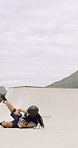 People, rollerskater and fall in urban skate park for outdoor hobby, accident or playful incident. Man, woman or partner clapping with tumble on ramp for motivation, trick or quick recovery on floor