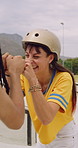 Happy people, rollerskater and friends with fist bump for social, winning or outdoor hobby. Man, woman or smile with helmet, touch or motivation for success, good job or bonding in city or town