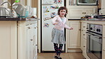 Face, child and energy with playing in home for development, restless movement or jumping. Active girl kid, person with adhd and hyperactivity in kitchen with running, dancing or impulsive on weekend