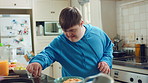 Dance, passion and man in kitchen with energy for performance, snack and expression in home. Happy, movement and person with down syndrome for hobby, entertainment and weekend fun in apartment