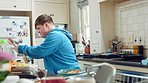 Music, cooking and man with spoon in kitchen for lunch, meal prep and ingredients for cuisine. Home, happy and person with down syndrome with rhythm, audio and track by counter for dinner recipe