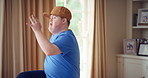 Dancing, rhythm and man with singing in lounge, weekend entertainment and music for self expression. Performance, karaoke and person with down syndrome in home, movement practice and hobby for fun