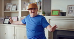 Man, face and happy in living room, dance and moving with energy and celebration on university break. Rhythm, home and person with down syndrome, excited and student with smile on weekend or fun