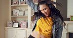 Dancing, happy and woman in home with music for good mood, positive energy and relax. Break, living room and person with headphones for streaming radio, audio and playlist for groove on weekend