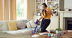 Woman, vacuum and dance in home with headphones, household chores or listen to music on weekend. Happy person, appliance and singing in house with housekeeping, fun or audio tech for streaming song.
