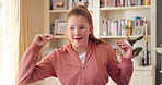 Dancing, rhythm and girl with music in home for fun holiday, vibe or weekend celebration. Teenager, child or dancer with happy movement, smile or energy for groove, sound or audio playlist in house