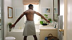 Back, black man and dancing for fun in bathroom with energy, morning routine and grooming. Male person, dancer and movement with rhythm, groovy performance and good mood for getting ready at house