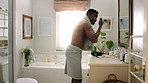 Dancing, bathroom and happy man with comb for hygiene, fun vibe or morning routine in home. Excited, male person or energy with movement in mirror for brushing hair, cleaning or grooming in house