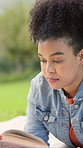 Woman, relax and reading book in park with calm weekend break, wellness or peace for fantasy literature. Person, rest or fiction novel outdoor with interesting story for knowledge, hobby or free time