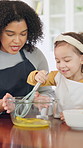 Teaching, egg and kid baking with mom in kitchen for recipe preparation in family home. Mixing, cooking education or girl learning for child development with mother, woman and dessert or sweat treat