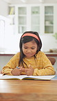 Counting, homework and child in home with education, test or learning for development. Answer, literacy and girl with independent thinking or writing in book for math knowledge, numbers and skills