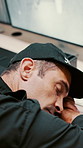 Tired, man and sleeping with security guard on desk for fatigue, burnout or overworked in office. Exhausted, male person or safety officer asleep on computer with surveillance for snooze or rest