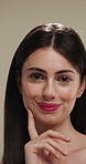 Face, makeup and woman with smile for beauty cosmetics, makeover or skincare on a studio background. Happy, portrait or female person with lip gloss, glow or shine for spa, salon or facial treatment