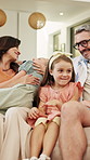Parents, children and relax in living room with family connection, love and smile for bonding together. Happy people, mother and father in home with girl kids, support and wellness on weekend break.
