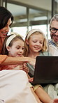 Laugh, parents and children with laptop in home for comedy movie, streaming show and weekend bonding. Happy, mature people and kids with tech in house for watching funny series, relax and connection