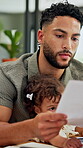 Documents, baby and multitask with man in home as freelancer, copywriter and reading. Paperwork, remote worker and workflow with person in house for time management, planning and research project
