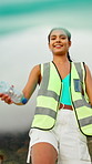 Women, volunteer and cleaning with plastic bottle for recycling or earth day together in nature. Female people, team or cleaners with rubbish or garbage for waste management or community service