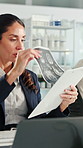 Woman, doctor and document with xray in office for brain scan, medical analysis and results. Mature person, laptop or paperwork for radiology report, healthcare assessment and neurology abnormalities