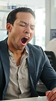 Office, tired and businessman at desk with yawn for deadline, overworked and medicine products. Pharma, sales rep and person with fatigue, sleepy and exhausted for pressure, low energy and burnout