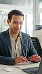 Typing, laptop and business man with smile for accounting report, review or good results. Happy, confident and professional person or accountant with computer for tax or audit approval in office