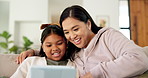 Child, mom and smile with tablet on sofa for games, bonding or click with movie choice in family home. Asian people, mother and daughter with tech, application and laugh with online contest at house