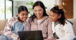 Video game, mom or children on sofa with laptop, playing together or good time in digital contest. Happy, parent or girls in home with tech, family bonding or fun competition in virtual activity.