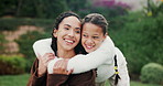 Laughing, mother and daughter with hug in garden, funny conversation and family time for connection. Bonding, embrace and happy woman with child in backyard, support and joke together on weekend