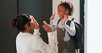 Mother, child and high five with bag in home for support, motivation and back to school. Woman, embrace and daughter for love, success and encourage student with backpack for learning reassurance 