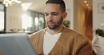 Tablet, relax and man on sofa, typing or online search for news website with app at living room. Technology, download and person in home for reading article with newsletter, ebook and internet blog