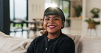 Face, relax and smile of girl child on sofa in home living room for development, future or growth. Break, comfortable and flare with happy kid on couch in apartment for holiday, morning or weekend