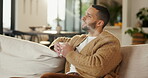 Thinking, smell or man with coffee on sofa, morning inspiration or remember memory for weekend peace. Calm, reflection and person with happiness for caffeine aroma, perspective and beverage in home