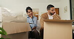 Stress, moving and couple new house with boxes and frustrated, tired or overwhelmed. Fatigue, conflict or woman and man confused, worried or disagreement with unpacking mistake, home or real estate