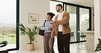Viewing, walking and couple in new home for real estate, discussion or decision for purchase. Property, looking around and people pointing for interior design with accommodation, house or planning