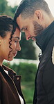 Love, smile and couple in park for bonding, support and commitment on weekend. Nature, morning and happy man with woman for connection, relationship and anniversary for romance or embrace together