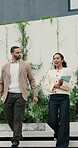 Realtor, tablet and people walking with outdoor discussion, property or investment proposal. Happy, tech and woman or agent with client for mortgage advice, planning or conversation for real estate 