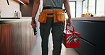 Back, man and plumber with toolbox in kitchen for inspection, maintenance and leaking pipe. Male person, technician and tools for appliance installation, plumbing system and household repair in home