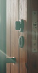 Wood, door and lock mechanism at house for entrance, residential security and handle for safety. Doorway, sunlight and secure entry for protection, locking system and latch design for home privacy